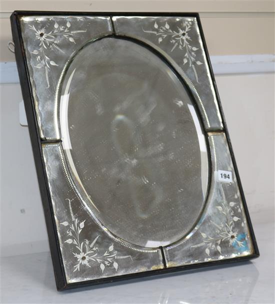 An oval Venetian table mirror with easel
